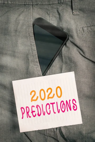 Note d'écriture montrant les prévisions 2020. Photo d'affaires présentant la déclaration sur ce que vous pensez qu'il se passera en 2020 Appareil smartphone à l'intérieur du pantalon papier de poche avant . — Photo