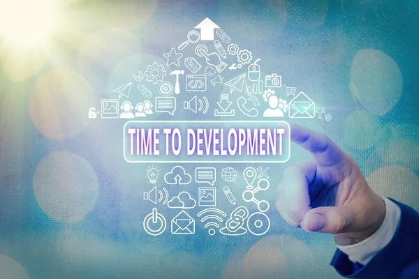 Handschriftliches Textschreiben Time To Development. Konzept bedeutet eine Zeitspanne, in der ein Unternehmen wächst oder sich entwickelt. — Stockfoto