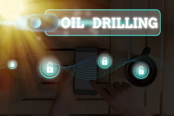 Word writing text Oil Drilling. Business concept for involves the drilling and pumping of oil from underground wells. — ストック写真