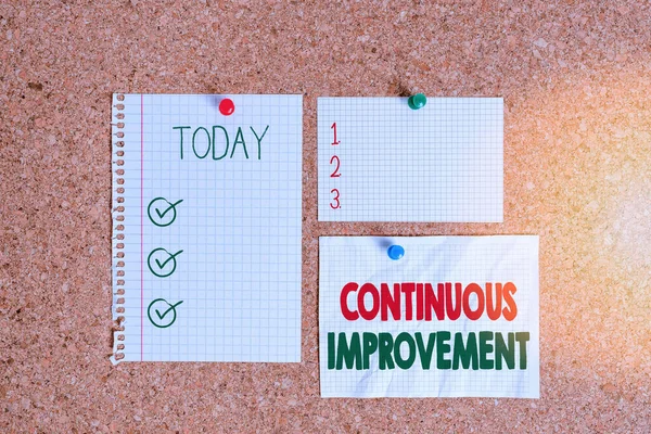 Text sign showing Continuous Improvement. Conceptual photo ongoing effort to improve products or processes Corkboard color size paper pin thumbtack tack sheet billboard notice board. — Stock Photo, Image