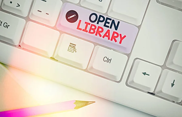 Nota di scrittura che mostra Open Library. Foto aziendali che mostrano l'accesso online a molti libri di pubblico dominio e outofprint . — Foto Stock