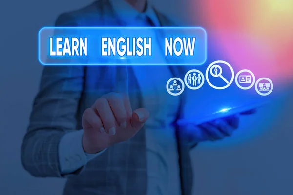 Conceptual hand writing showing Learn English Now. Business photo text gain or acquire knowledge and skill of english language.