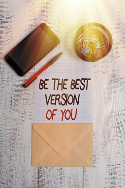 Writing note showing Be The Best Version Of You. Business photo showcasing going to move away from where are start improving Smartphone paper sheet clips pen envelope wooden vintage background. clipart