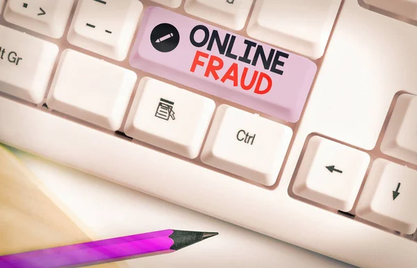 Writing note showing Online Fraud. Business photo showcasing use of Internet services to deceive victims and steal money. — Stock Photo, Image