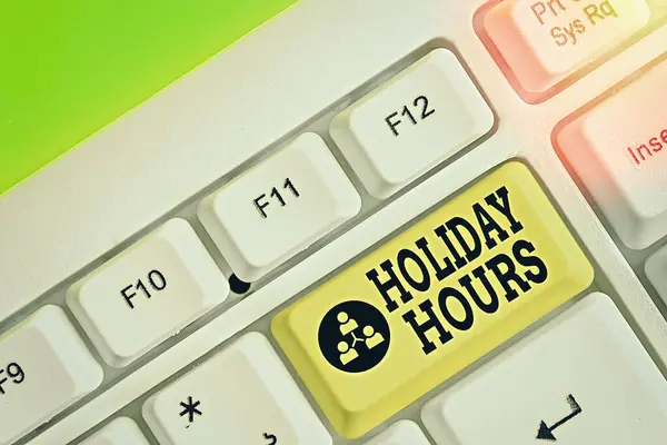 Holiday Hours 'u gösteren kavramsal el yazısı. İş fotoğrafı çalışanı saatlerce normal ücretlerinin iki katını alıyor.. — Stok fotoğraf