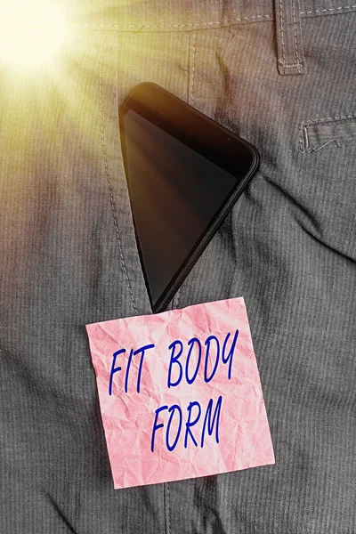 Signe texte montrant la forme du corps. Photo conceptuelle se réfère à un corps qui s'alignent parfaitement de forme et de contour dispositif Smartphone à l'intérieur pantalon de travail formel poche avant près du papier de note . — Photo