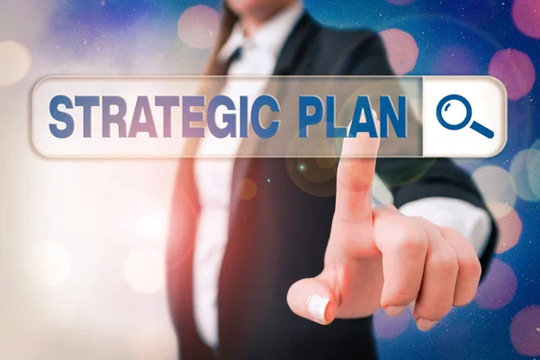 Writing note showing Strategic Plan. Business photo showcasing a systematic process of envisioning a desired future. — Stock Photo, Image