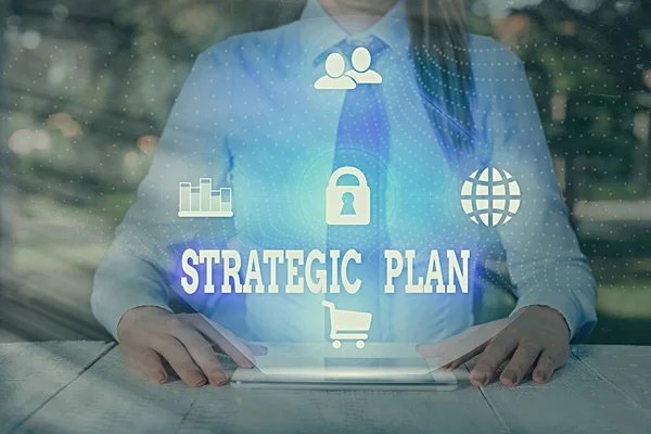 Escribir texto a mano Plan Estratégico. Concepto que significa un proceso sistemático de concebir un futuro deseado . —  Fotos de Stock