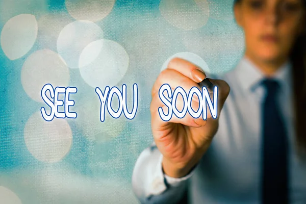 Texto de escritura de palabras Nos vemos pronto. Concepto de negocio para decir adiós a alguien y volver a vernos pronto . — Foto de Stock
