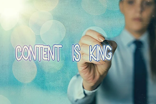 Word writing text Content Is King. Business concept for marketing focused growing visibility non paid search results.