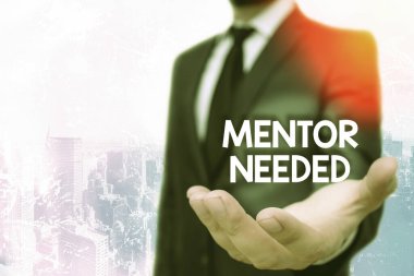 Akıl hocasının ihtiyaç duyulduğunu gösteren kavramsal el yazısı. İş fotoğrafı çalışanı eğitimi danışman olarak atanmış..