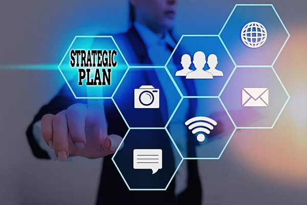 Writing note showing Strategic Plan. Business photo showcasing a systematic process of envisioning a desired future. — Stock Photo, Image