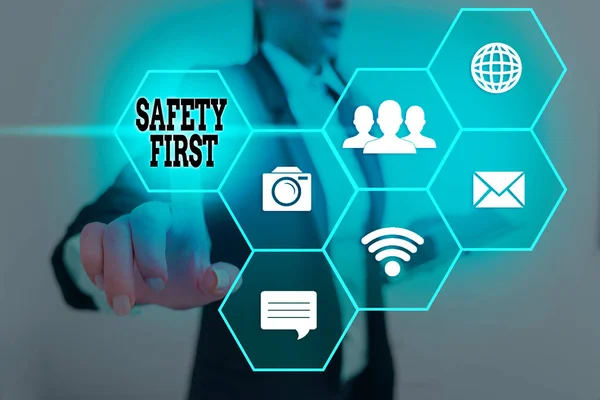 Writing note showing Safety First. Business photo showcasing used to say that the most important thing is to be safe. — Stock Photo, Image