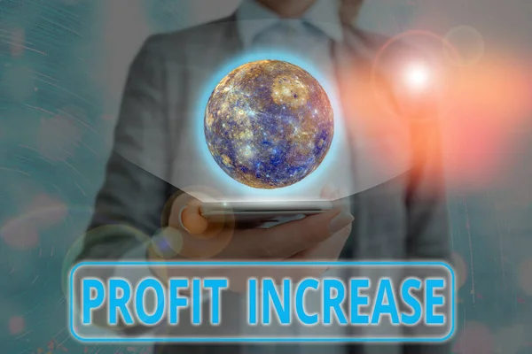 Escribir nota mostrando Aumento de Beneficios. Foto comercial que muestra el crecimiento en la cantidad de ingresos obtenidos de un negocio Elementos de esta imagen proporcionados por la NASA . — Foto de Stock