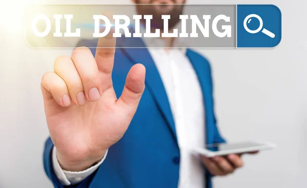 Word writing text Oil Drilling. Business concept for involves the drilling and pumping of oil from underground wells. — ストック写真