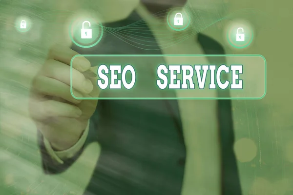 Handgeschreven tekst schrijven SEO service. Concept betekenis technieken en procedures om de zichtbaarheid van de website te vergroten. — Stockfoto