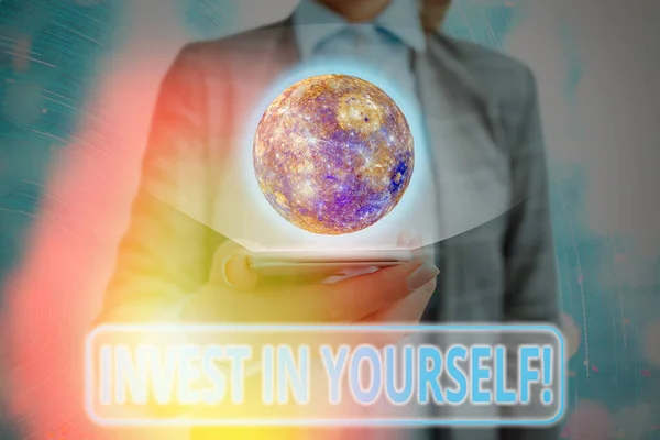 Writing note showing Invest In Yourself. Business photo showcasing nvesting in a coach or a training to learn new things Elements of this image furnished by NASA. — Stock Photo, Image