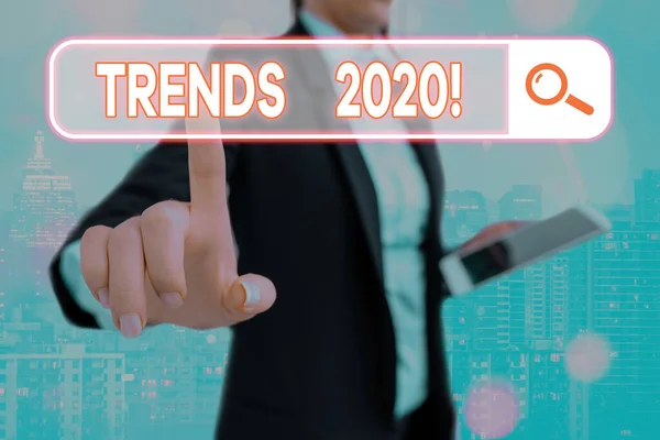 Schrijf notitie met de Trends 2020. Zakelijke foto waarin de algemene richting wordt belicht waarin iets zich ontwikkelt of verandert. — Stockfoto