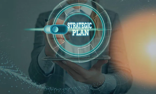 Writing note showing Strategic Plan. Business photo showcasing a systematic process of envisioning a desired future. — Stock Photo, Image