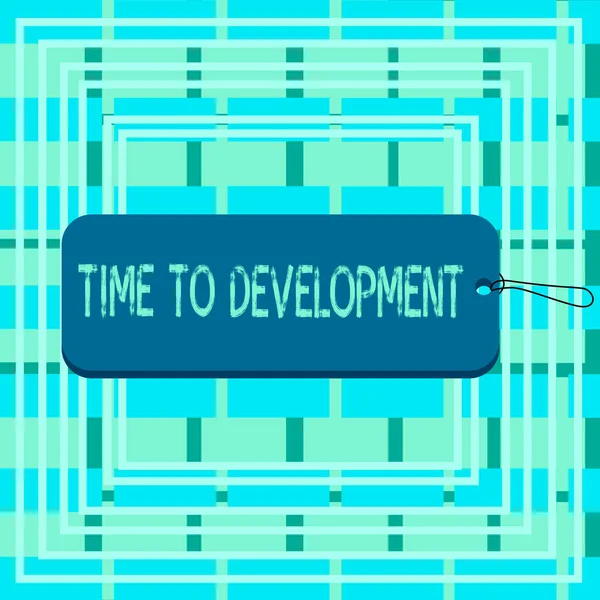 Signo de texto que muestra Time To Development. Foto conceptual una longitud de tiempo durante el cual una empresa crece o desarrolla etiqueta etiqueta placa rectángulo en forma de espacio vacío cadena colorido fondo . — Foto de Stock