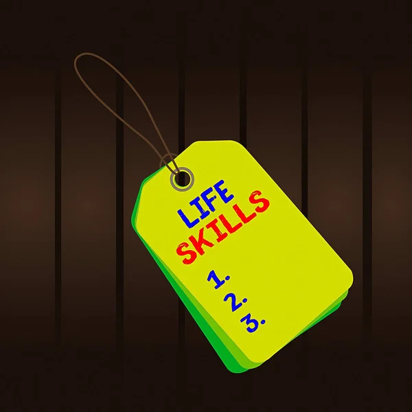 Writing note showing Life Skills. Business photo showcasing skill that is necessary for full participation in everyday life Rectangle badge attached string colorful background with tag.