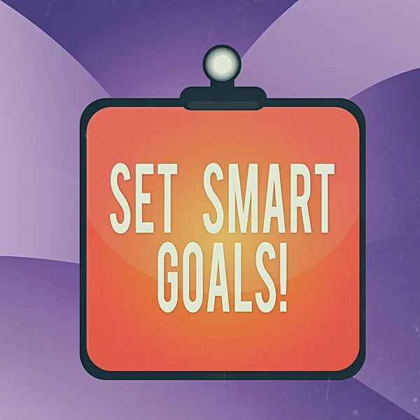 Handschrift tekstschrijven Set Smart Goals. Concept betekent het geven van criteria om te begeleiden bij het instellen van doelstellingen Kleurrijke achtergrond klembord veerklem binden lege plank frame. — Stockfoto