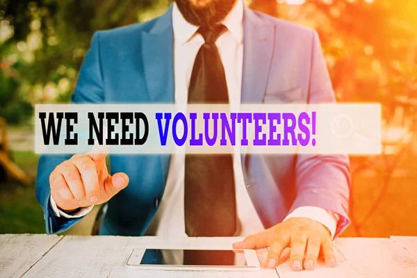 Writing note showing We Need Volunteers. Business photo showcasing someone who does work without being paid for it. — Stock Photo, Image