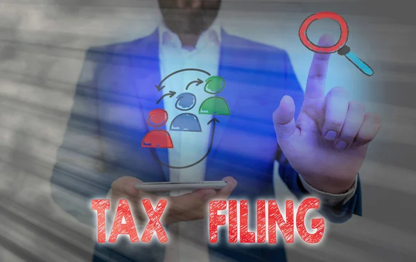 Text sign showing Tax Filing. Conceptual photo Submitting documens filed with tax payer financial information. — Stock Photo, Image