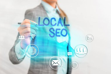 Yerel Seo 'yu gösteren kavramsal el yazısı. İş fotoğrafı metni web sitenizi yerel bir izleyici için daha iyi sıralayacak şekilde optimize etti.