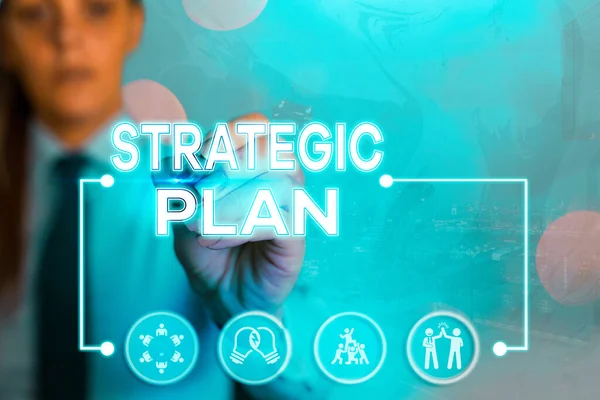 Writing note showing Strategic Plan. Business photo showcasing a systematic process of envisioning a desired future. — Stock Photo, Image