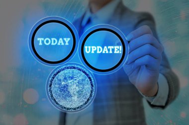 Güncellemeyi gösteren kavramsal el yazısı. İş fotoğraflarının sergilenmesi, NASA tarafından desteklenen bu görüntünün yazılım programları gibi daha modern ya da güncel bir şey yaratıyor..