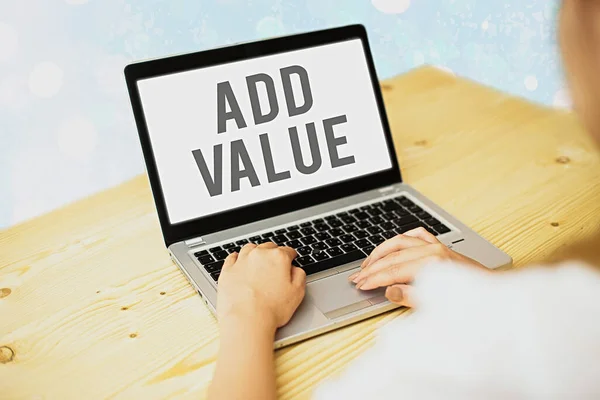 Writing note showing Add Value. Business photo showcasing an improvement or addition to something that makes it worth more.