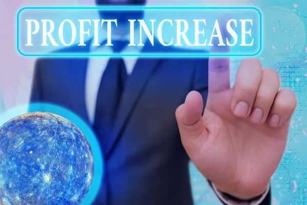 Schreibender Zettel mit Gewinnsteigerung. Business-Foto, das das Wachstum der Einnahmen aus einem Geschäft Elemente dieses Bildes von der NASA geliefert. — Stockfoto