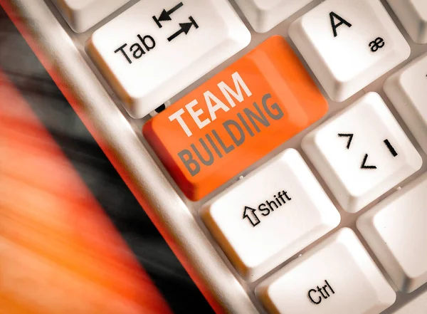 Conceptual hand writing showing Team Building. Business photo text various types of activities used to enhance social relations. — Stock Photo, Image