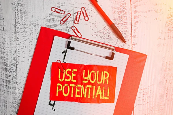 Text sign showing Use Your Potential. Conceptual photo achieve as much natural ability makes possible Clipboard paper sheet clips ballpoint crushed note old vintage background.
