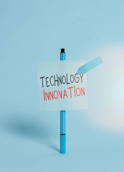 Conceptual hand writing showing Technology Innovation. Business photo showcasing significant technological changes of products Ballpoint sticky note arrow banner peaceful cool background.