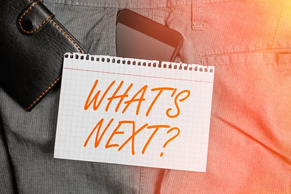 Handwriting text What Next Question. Concept meaning asking demonstrating about his coming actions or behaviors Smartphone device inside trousers front pocket with wallet and note paper.
