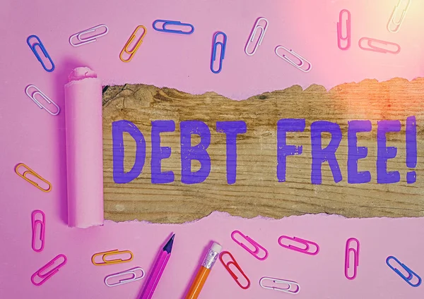 Conceptual hand writing showing Debt Free. Business photo showcasing does not owning any money to any individual or companies.