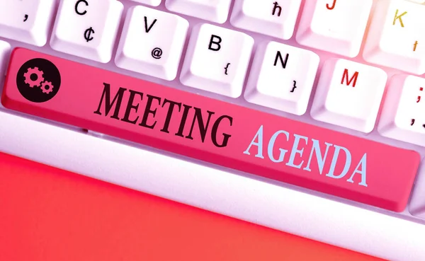Texto para escrita de palavras Agenda da reunião. Conceito de negócio para itens que os participantes esperam realizar em uma reunião . — Fotografia de Stock