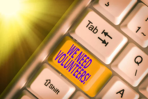 Writing note showing We Need Volunteers. Business photo showcasing someone who does work without being paid for it. — Stock Photo, Image