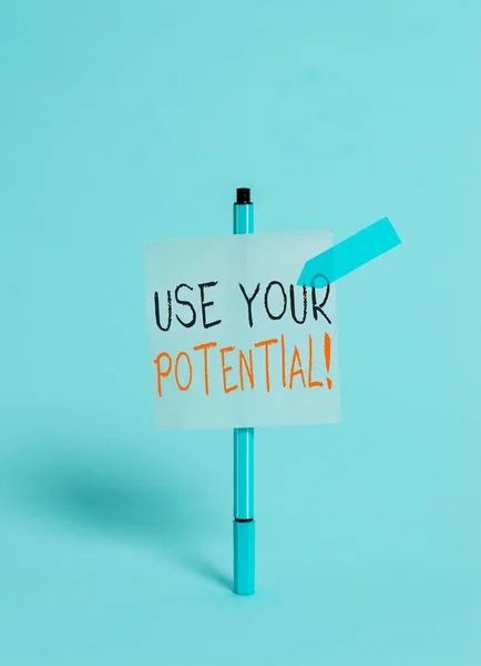 Conceptual hand writing showing Use Your Potential. Business photo showcasing achieve as much natural ability makes possible Ballpoint sticky note arrow banner peaceful cool background.