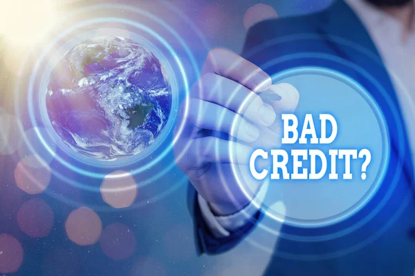 Handwriting text Bad Creditquestion. Concept meaning inabilityof a demonstrating to repay a debt on time and in full Elements of this image furnished by NASA.