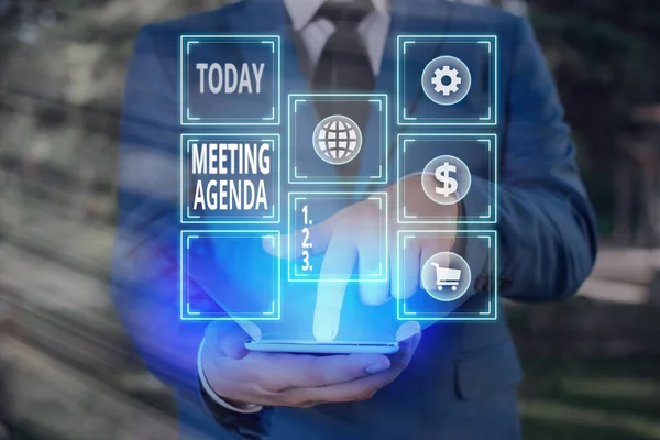Writing note showing Meeting Agenda. Business photo showcasing items that participants hope to accomplish at a meeting.