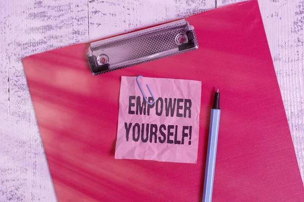 Conceptual hand writing showing Empower Yourself. Business photo text taking control of our life setting goals and making choices Colored clipboard crushed sticky note marker old wooden background. — Stock Photo, Image