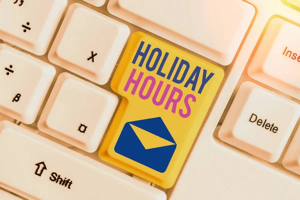 Holiday Hours 'u gösteren kavramsal el yazısı. İş fotoğrafçıları saatlerce normal ücretlerinin iki katını alıyor.. — Stok fotoğraf