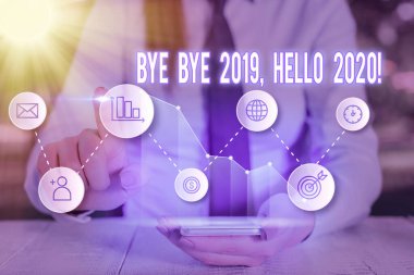 Kelime yazma 2020 Hoşçakalın Merhaba 2020 iş konsepti geçen yıla elveda demek ve bir başka güzel kadını karşılamak.