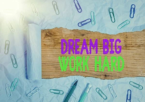 Handwriting text Dream Big Work Hard. Concept meaning Believe in yourself and follow the dreams and goals.