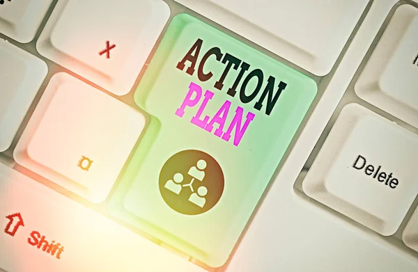 Word writing text action plan. Geschäftskonzept für einen detaillierten Plan mit Maßnahmen zur Erreichung von Zielen oder Visionen. — Stockfoto