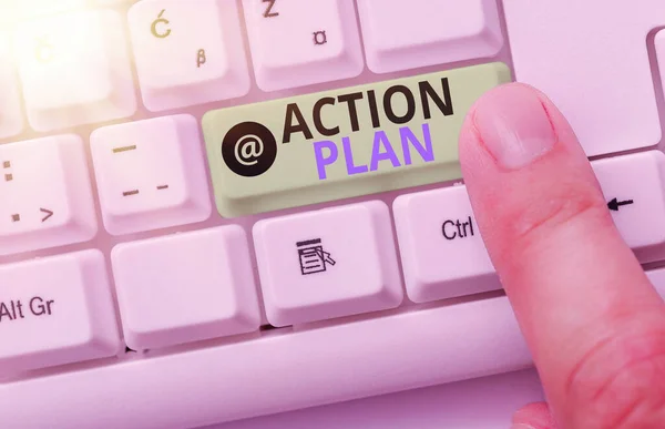 Word writing text action plan. Geschäftskonzept für einen detaillierten Plan mit Maßnahmen zur Erreichung von Zielen oder Visionen. — Stockfoto