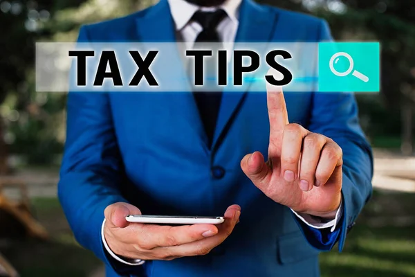 Text sign showing Tax Tips. Conceptual photo compulsory contribution to state revenue levied by government. — Stock Photo, Image